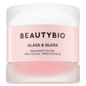 Słoiczek produktu BeautyBio Glass & Gloss Megawatt Glow Pro-Facial. Eleganckie opakowanie w odcieniach różu i bieli z czarnym napisem. Produkt obiecuje profesjonalny efekt promiennej, świetlistej skóry.