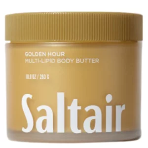 Żółty słoik Saltair Golden Hour Multi-Lipid Body Butter, bogate w lipidy masło do ciała o ciepłym, otulającym zapachu.