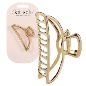 Złota klamra do włosów na tle różowego opakowania marki Kitsch, z mniejszą wersją klamry umieszczoną na kartoniku. Produkt prezentuje minimalistyczny, ale elegancki wygląd.