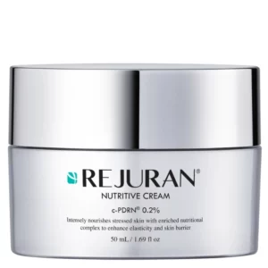 Zbliżenie na pojedynczy słoiczek REJURAN Nutritive Cream, ukazujące jego minimalistyczny i luksusowy design.