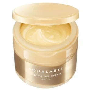 Zdjęcie przedstawia minimalistyczne, otwarte, opakowanie w kolorze złotym kremu nawilżającego Shiseido Aqualabel Special Gel Cream Oil In.