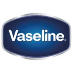 Logo marki Vaseline w kształcie niebieskiej tarczy z białym napisem „Vaseline” pośrodku, otoczone srebrną ramką.