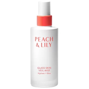 Buteleczka Peach & Lily Glass Skin Veil Mist z matowego szkła i koralowym detalem, przedstawiona na białym tle w ujęciu katalogowym.