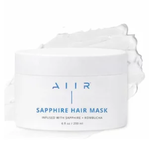Zdjęcie t maski do włosów AIIR Sapphire Hair Mask w białym słoiku na jasnym tle, z widoczną kremową konsystencją produktu.