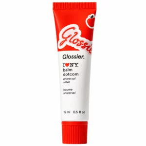 Glossier Balm Dotcom I ❤️ NY – balsam do ust i skóry w czerwono-białej tubce, pokazany centralnie na czystym białym tle w kwadratowym kadrze.