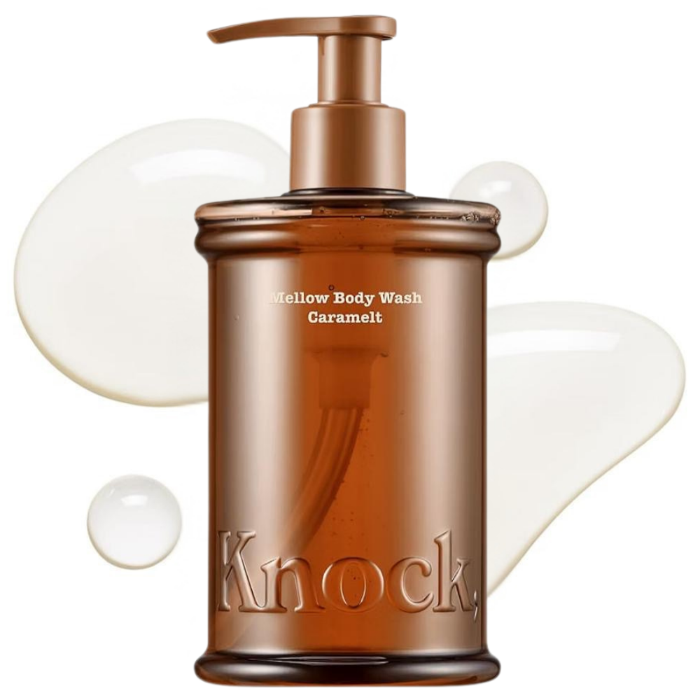 Knock Mellow Body Wash Caramelt KNOCK Mellow Body Wash Caramelt 300 ml – karmelowy żel do mycia ciała w bursztynowej butelce z pompką na białym tle.