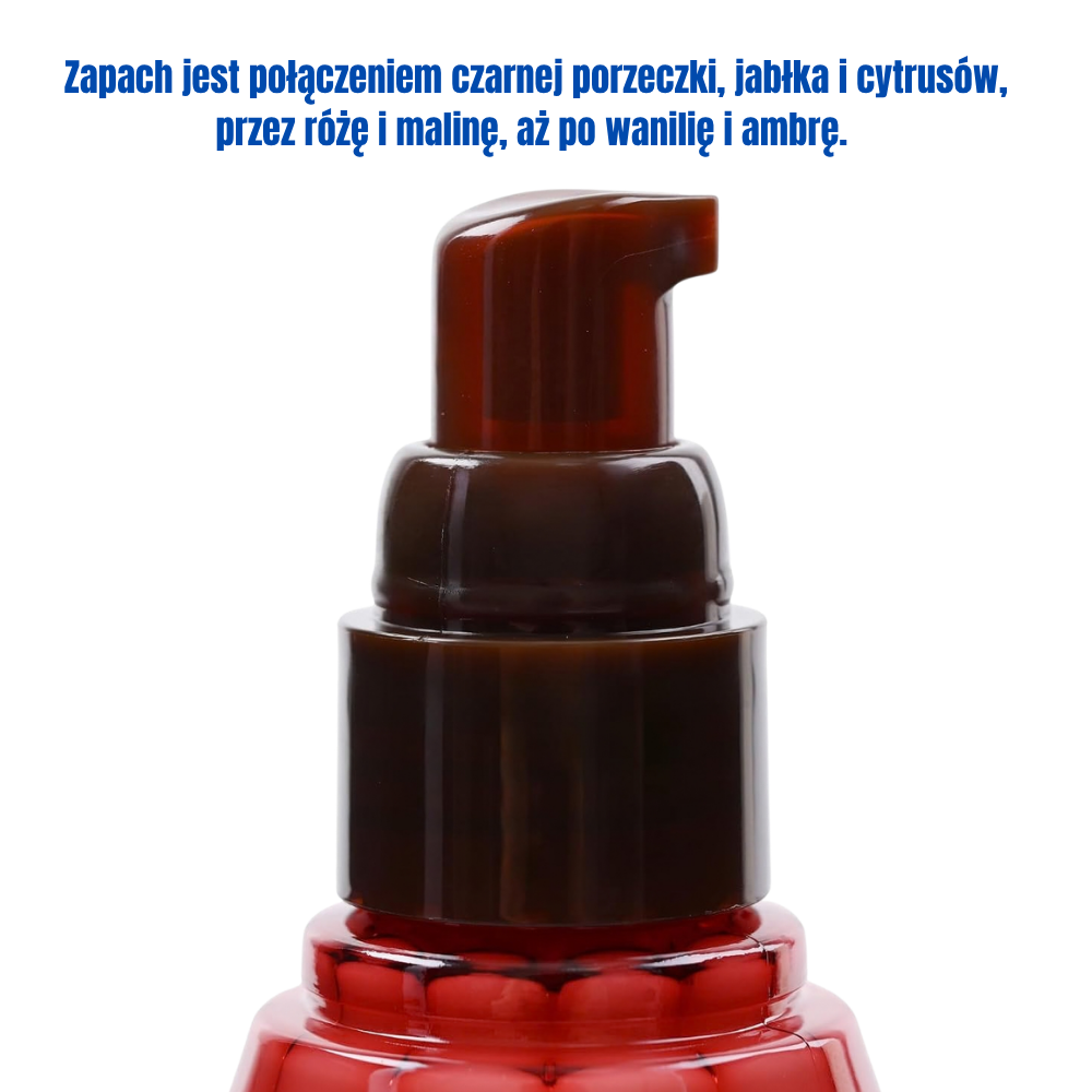Milbon Elujuda Hair Treatment Emulsion (5) Milbon Elujuda Emulsion+ - zbliżenie na pompkę produktu z informacją o zapachu łączącym czarną porzeczkę, jabłko, cytrusy, różę, malinę, wanilię i ambrę.