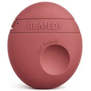 REMEDY Hand Remedy - regenerujący krem do rąk i skórek w różowym, kompaktowym opakowaniu.