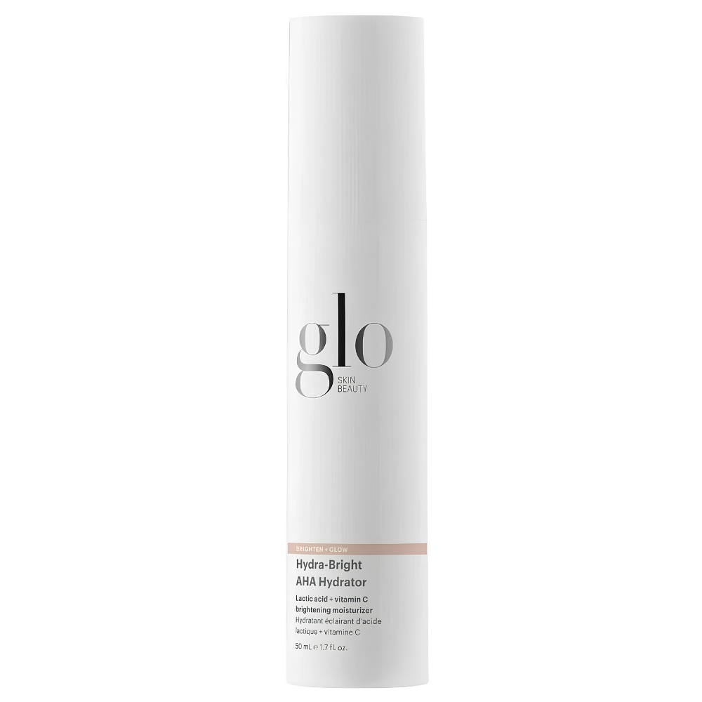Glo Skin Beauty Hydra Bright AHA Hydrator Glo Skin Beauty Hydra-Bright AHA Hydrator - nawilżający krem rozświetlający z kwasem mlekowym AHA i witaminą C, 50 ml. Biała butelka z pompką i minimalistycznym logo marki na białym tle.