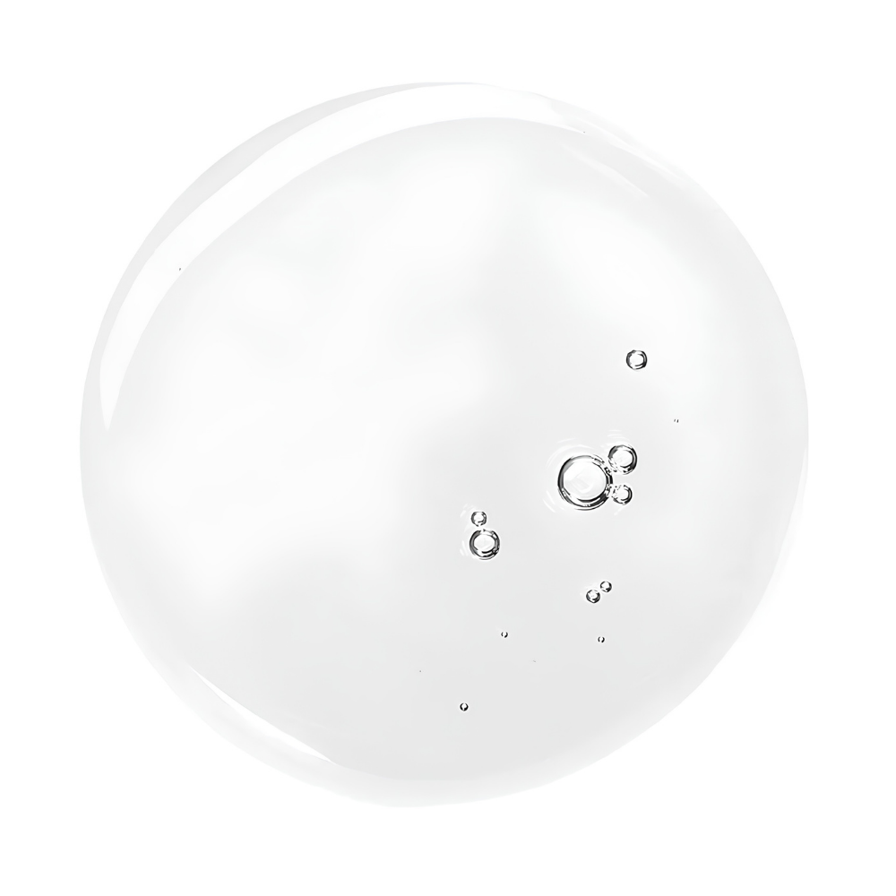 Glo Skin Beauty Hydra-Bright Pro 5 Liquid Exfoliant (4) Glo Skin Beauty Hydra-Bright Pro 5 Liquid Exfoliant - zbliżenie na transparentną, płynną konsystencję peelingu złuszczającego z kwasami AHA i PHA. Przezroczysta kropla z delikatnymi pęcherzykami powietrza na białym tle, prezentująca lekką formułę kosmetyku do wygładzania i rozświetlania skóry.