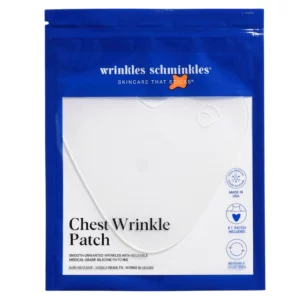 „Niebiesko-biała saszetka Wrinkles Schminkles Chest Wrinkle Patch z widocznym silikonowym płatkiem na dekolt oraz informacjami o ponownym użyciu i produkcji w USA.”