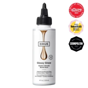 Na zdjęciu znajduje się butelka produktu dpHUE Glossy Glaze w odcieniu "Golden Blonde" z trzema nagrodami kosmetycznymi widocznymi obok.