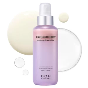 Fioletowo-różowa butelka kremowej mgiełki liftingującej BOH Probioderm 3D Lifting Cream Mist w otoczeniu kropel produktu w różnych konsystencjach.
