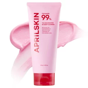 „Różowe opakowanie żelu oczyszczającego AprilSkin TXA Niacinamide 99 Deep Cleanser o pojemności 120 g, ustawione na tle rozsmarowanej warstwy różowej pianki.”