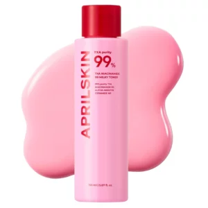 Różowa butelka AprilSkin TXA Niacinamide 99 Milky Toner o pojemności 150 ml, z czerwonym korkiem i białym napisem APRILSKIN wzdłuż opakowania. W tle widoczna mleczno-różowa rozlana emulsja, nawiązująca do konsystencji toniku.”