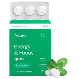 Opakowanie gumy Neuro Energy & Focus z widocznym blistrem zawierającym dziewięć pastylek oraz dekoracyjnymi listkami mięty u podstawy.