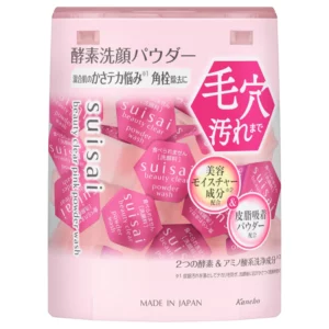 Zbliżenie na różowe opakowanie pudru Suisai Beauty Clear Pink Powder Wash z heksagonalnymi kapsułkami w środku i japońskimi napisami promującymi nawilżenie i oczyszczanie porów.