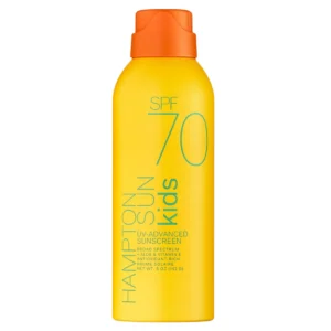 Butelka sprayu przeciwsłonecznego Hampton Sun SPF 70 Kids w kolorze żółtym z pomarańczowym korkiem, widok od przodu, zawierająca informacje: „SPF 70, UV-Advanced Sunscreen, Broad Spectrum, + Aloe & Vitamin E, Antioxidant-Rich, Net Wt. 5 oz (142 g)”.