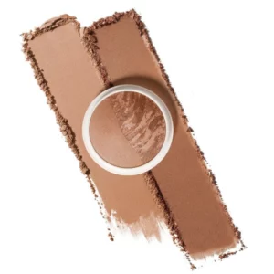 Otwarty Dibs Duet Baked Bronzer na tle rozmazanego produktu w kolorze średniego brązu.