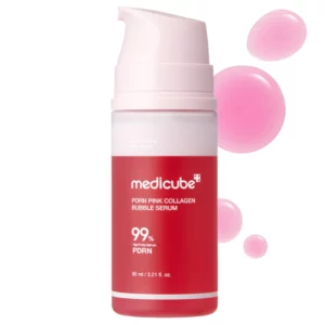 Butelka serum Medicube PDRN Pink Collagen Bubble Serum w odcieniach różu i czerwieni, z napisem „99% High Purity Salmon PDRN”. W tle różowe krople serum.