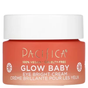 Zbliżenie na pomarańczowy słoiczek Pacifica Glow Baby Eye Bright Cream z białą nakrętką i złotym logo marki Pacifica – minimalistyczna prezentacja produktu.