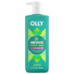 Zielona butelka OLLY Revive Mood + Skin Body Wash o pojemności 502 ml, z białą pompką i geometryczną zielono-żółtą grafiką na etykiecie, sfotografowana na czystym białym tle.