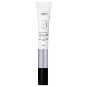 Packshot HeveBlue Black Yuja Bean Lifting Auto Eye Cream w tubce z metalicznym aplikatorem, produkt liftingujący i rozświetlający skórę pod oczami.