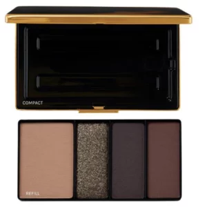 Zamknięte złoto-czarne etui Victoria Beckham Beauty do palety cieni, z lustrzaną, lakierowaną pokrywą i złotym logo marki pośrodku.