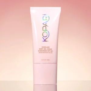 Kopari Sunglaze Body Gel Cream SPF 50+ w różowym opakowaniu – lekki żelowy krem przeciwsłoneczny do ciała, ochrona UVA/UVB.