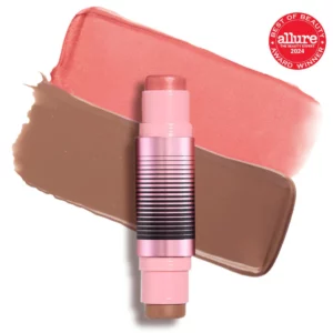 Sztyft Dibs GlowTour Duo z kremową teksturą w odcieniach różu i brązu na jasnym tle.
