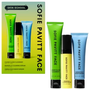 Opakowanie zestawu Sofie Pavitt Face Skin School z trzema produktami do pielęgnacji twarzy na tle graficznym.