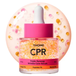 Butelka serum THOME CPR z widocznymi kapsułkami składników w środku, na jasnym tle, prezentacja produktu.