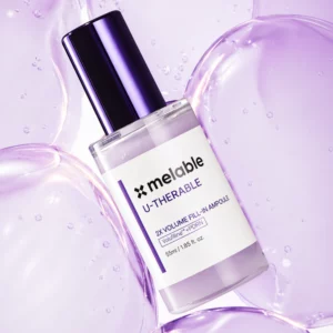 Melable U-Therable 2x Volume Fill-In Ampoule serum do twarzy na tle kropli i struktur nawilżających.