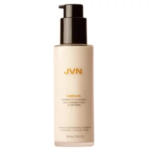 JVN Complete Blowout Styling Milk w eleganckiej butelce z pompką na jasnym tle.