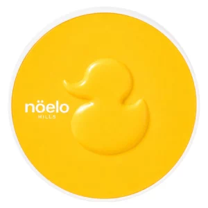 Noelo Hills Skin Barrier Sun Cushion SPF50+ PA++++ – kompaktowy cushion ochronny z charakterystycznym żółtym wzorem kaczuszki na wieczku.