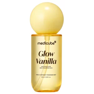 Mgiełka do ciała i włosów Medicube Glow Vanilla na białym tle. Produkt z kwasem kojowym i kwasem hialuronowym otula skórę ciepłym waniliowym zapachem, jednocześnie nawilżając i pozostawiając promienny wygląd.