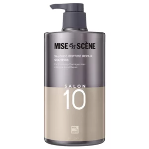 Szampon Mise En Scene Salon 10 Peptide Repair Shampoo 990 ml w szaro-beżowej butelce z pompką na białym tle.