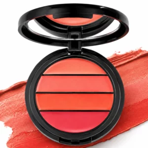 makeup 11 Otwarta paleta Laura Geller Color Impact Cream Lip & Cheek Stripes z kremowymi odcieniami Bare Essentials, ustawiona na białym tle na tle rozmazanego koralowego pigmentu.