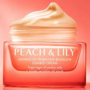 Peach & Lily Advanced Rebound BioGlow Zombie Cream™ w pomarańczowym, kwadratowym słoiczku z koralową zakrętką, przedstawiony frontem na czystym białym tle.
