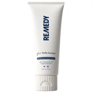 Start 46 Remedy Science KP Exfoliating Body Scrub - peeling wygładzający do ciała w białej tubie na jasnym tle.