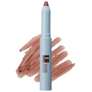 Jasnoniebieska kredka KJH Brand Prism Lite Lip Crayon w odcieniu Enigma na tle jasnego, perłowo-różowego swatcha.