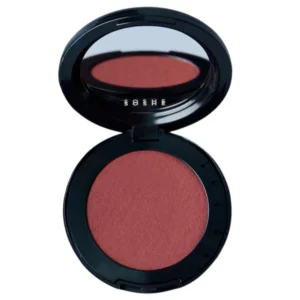 Start 112 Soshe Blurring Pillow Blush - róż do policzków w przygaszonym, różowo-malinowym odcieniu, w otwartym, eleganckim czarnym kompakcie z lusterkiem, prezentowany na białym tle.